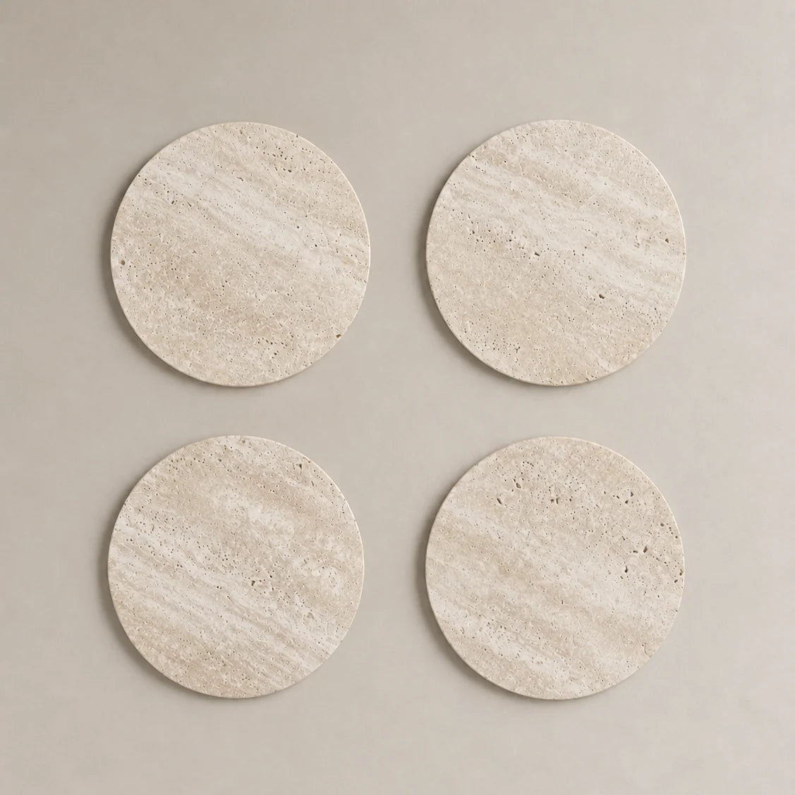 Set de cuatro posavasos redondos beige